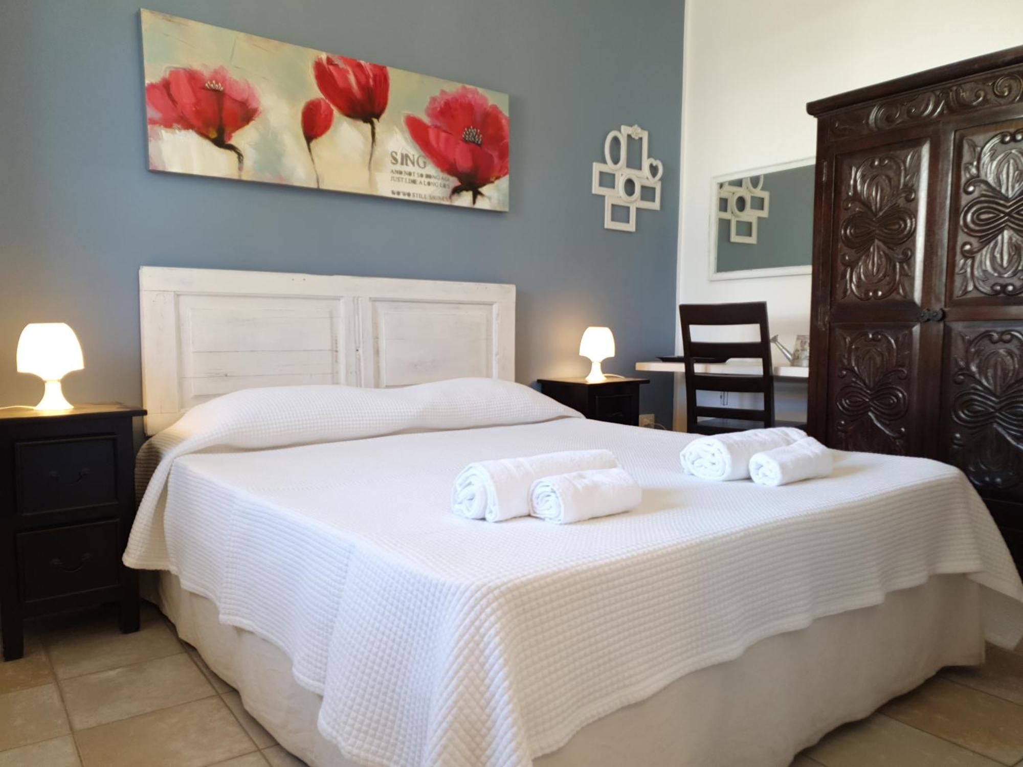 Blue Dolphin Guest House Alghero Esterno foto