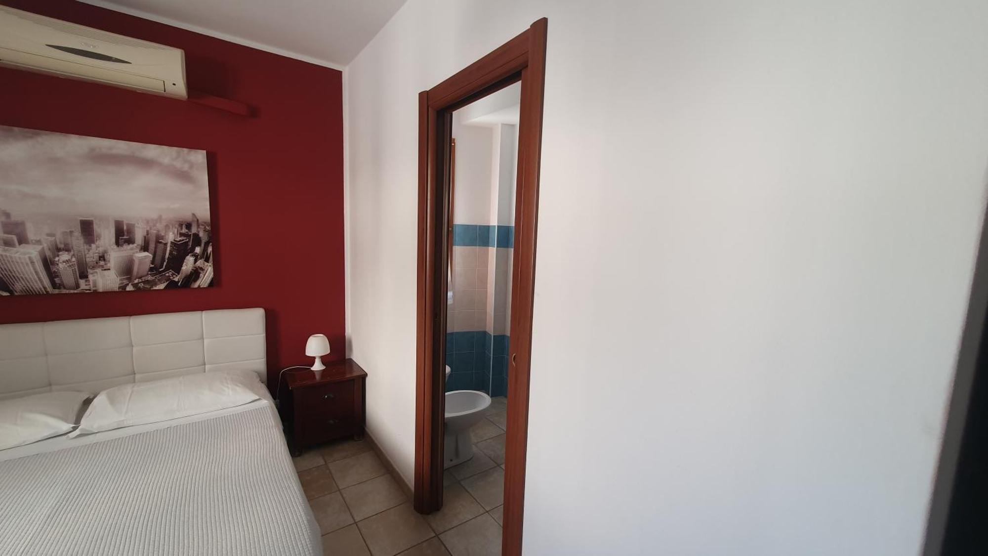 Blue Dolphin Guest House Alghero Esterno foto
